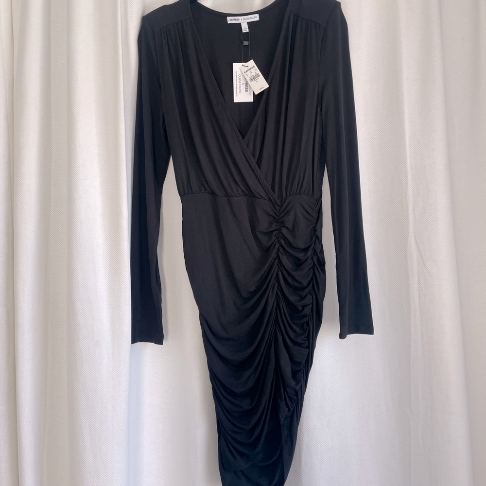 Black bodycon dress with shoulder pads